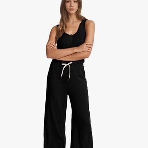 Amazon Black Jumpsuit with White Tie